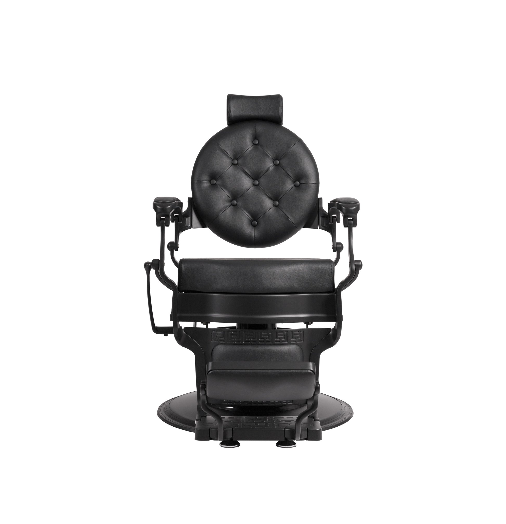 Black barber chair with tufted backrest on a white background