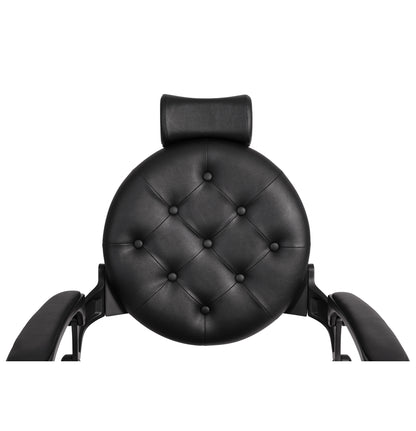 Black circular headrest with buttoned texture on a white background