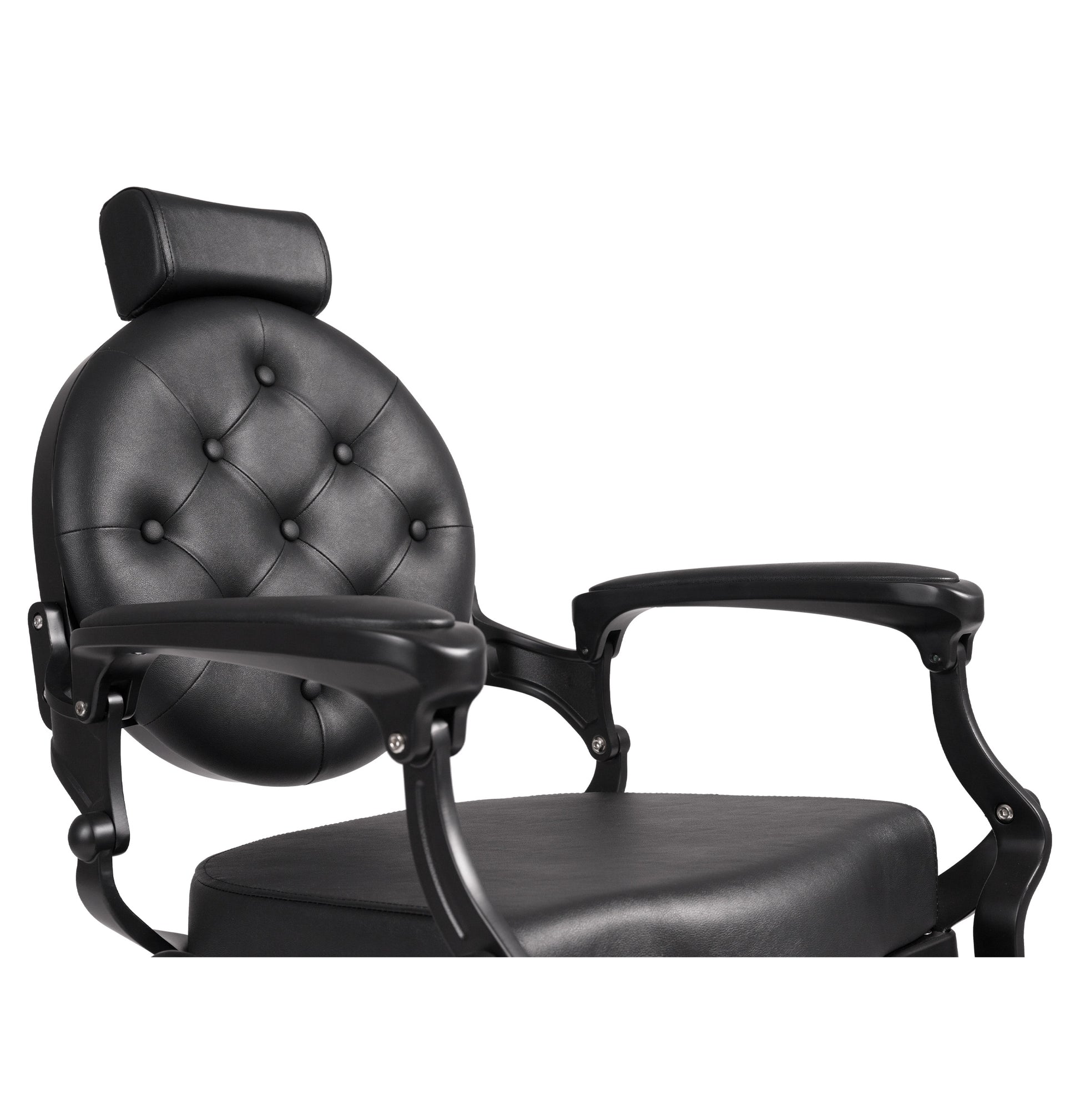 Black barber chair with buttoned backrest on a white background