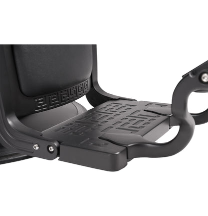 Close-up of a black motorcycle seat with textured design on a white background